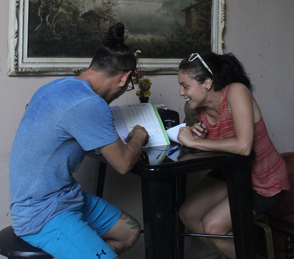 Two people learning Spanish